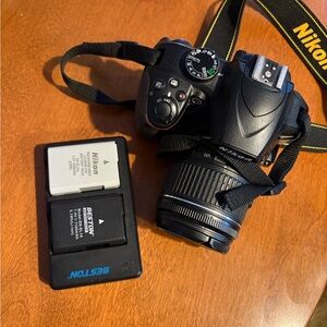 Nikon Black DSLR Camera with Lens and Charger